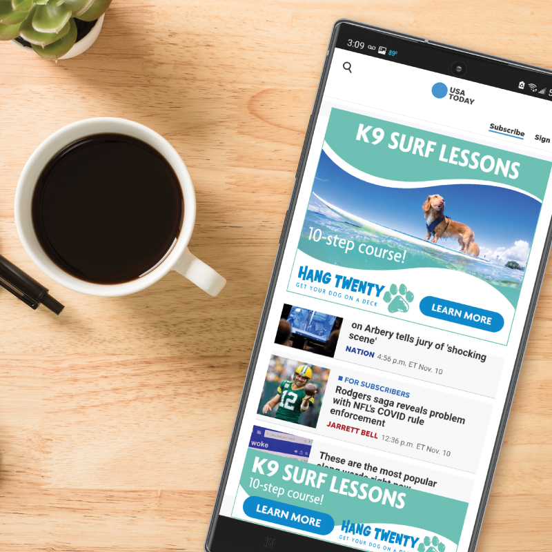 Mobile phone showing display ad.